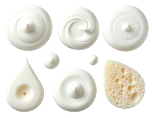 Overhead shot of swirls and shapes of dairy and cheese products, on black