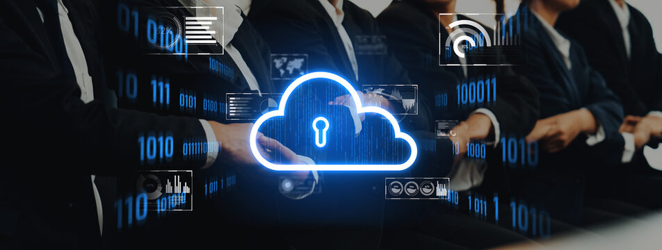A group of business professionals in suits discuss technology and cloud security concepts surrounded by digital data visualizations in a modern conference setting. Trope