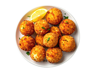 Overhead view of a white plate filled with golden, round, fried food and lemon