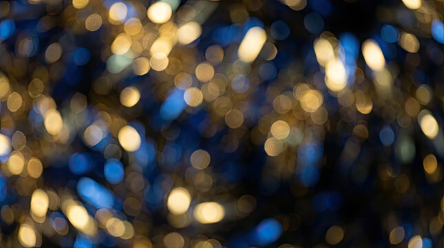 Dark Blue Abstract Background with Golden Glitter and Bokeh Lights
