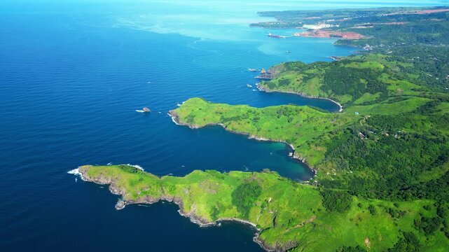 Overhead aerial of the Mariveles Five Fingers in Bataan, capturing lush green peninsulas jutting into the deep blue sea with rugged cliffs and intricate coastline formations.