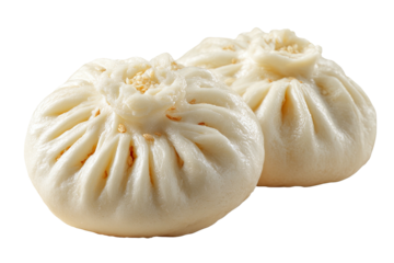 Two fluffy, white, steamed bao buns with sesame seeds