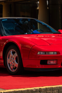 Red Honda NSX front fender and wheel arch closeup, Classic japanese supercar side detail