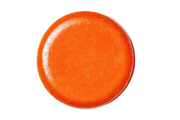 Glossy orange button with faint sparkle isolated on black
