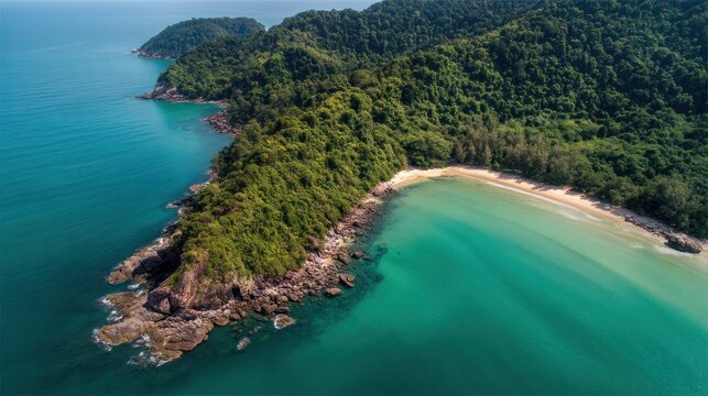 A breathtaking aerial view of a lush tropical island with a pristine white sand beach, turquoise waters, and lush greenery, set against a stunning blue sky.