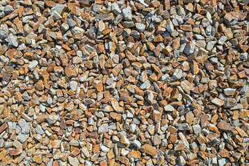 Detail of the abstract texture of gravel stones on the ground