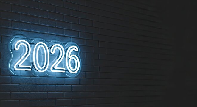 Blue 2026 glows on brick, 2026 marks future, 2026 lights up dark wall
