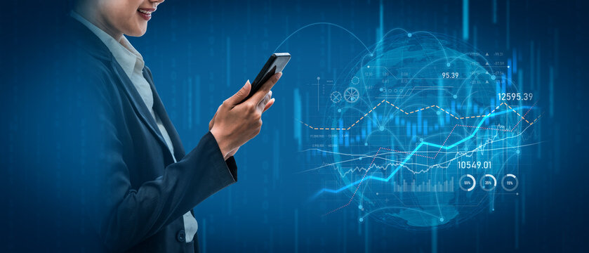 A business professional engages with a smartphone, surrounded by dynamic digital graphs and data analytics, showcasing modern technology influence on finance. Scalp