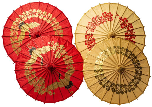 Exquisite vintage parasols showcasing iconic crane and floral motifs, perfect for elegant Asian-inspired designs or artistic cultural projects and heritage celebrations