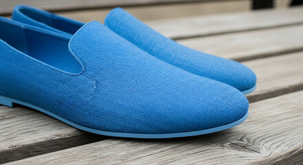 Blue shoes on a wooden surface