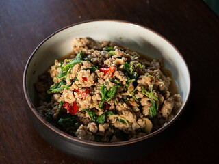 Pad Kaprao, Thai stir fried minced pork with holy basil leaves, chili pepper and garlic