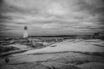 Peggy's Cove Lighthouse stands as a timeless beacon against the rocky shores of Nova Scotia's picturesque coastline.