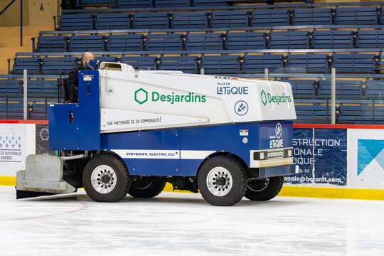 Canada, 07 November 2025 : Zamboni machine resurfaces ice rink during hockey arena maintenance process