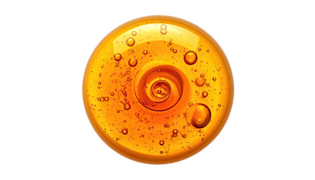 A golden orb of swirling liquid with bubbles against a stark black background