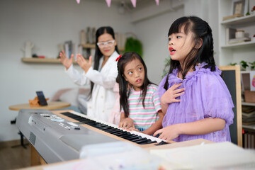 Children learning and playing piano happily in a bright living room, Teacher and girls engaging in music education with a keyboard and a smartphone