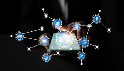 A conceptual image depicting digital connectivity through touchscreen interaction, featuring abstract icons representing technology, communication, and business networking. Crux