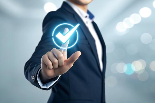 Businessman's hand touching a virtual digital screen button to initiate a global technology communication network concept