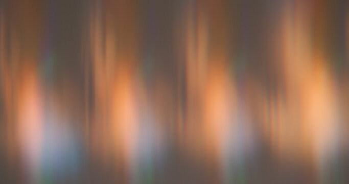 Blur line leak. Prism effect glow. Orange gray blue striping luminescent pattern on dark abstract background color art ray stream.