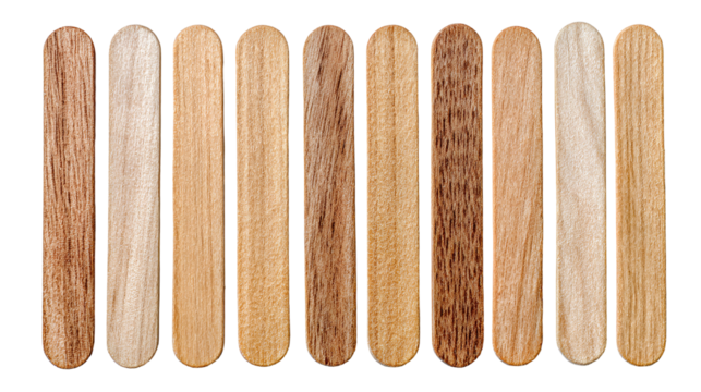 Collection of wooden popsicle sticks arranged in a row isolated on transparent background