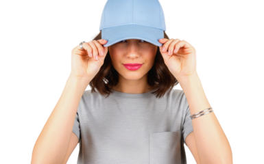 Stylish young woman wearing blank light blue baseball cap isolated on white background