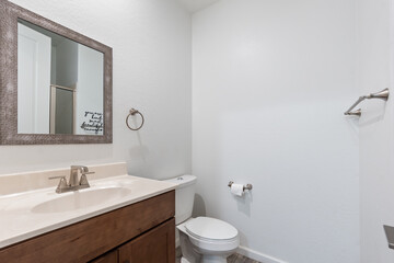 efficient compact washroom design, guestready compact powder room with tiles and wooden fixtures