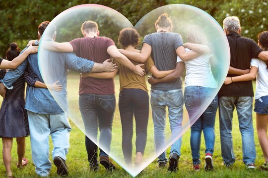 Group of friends huddle in rear view together