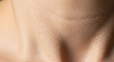 Close up of human skin texture showing fine details and subtle variations.