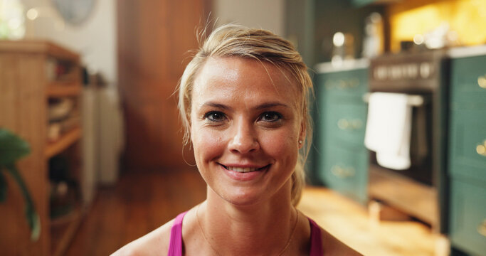 Home, portrait and happy woman with fitness, relax and warm up with morning routine. Apartment, athlete and healthy person with break, exercise and workout with training, start day and resting