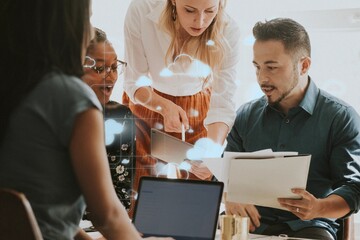 Business people working with a digital tablet in a meeting