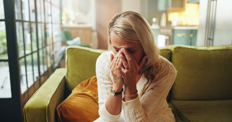 Crying, woman and sad on couch in home, grieving and unhappy with breakup, mental health or...