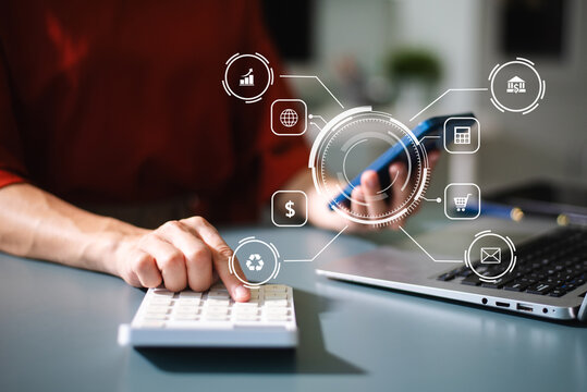 Businesswoman uses a tablet to analyze data on a virtual interface, symbolizing business innovation, technology, and global connection