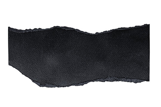 A dark gray torn piece of material against a black background with rough edges visible
