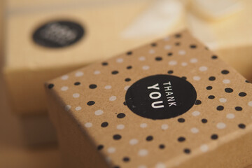 Gift boxes with thank you labels in close-up view