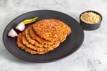Bajra paratha is a nutritious Indian flatbread made from pearl millet flour, dense, earthy, fiber-rich, gluten-free, warming, ideal for winter meals.

