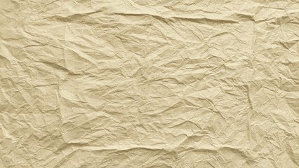 Crumpled brown paper sheet texture. Natural recycled brown paper crumpled background.