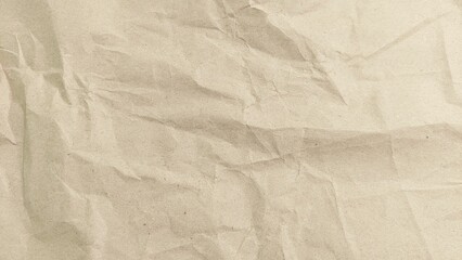 Crumpled brown paper sheet texture. Natural recycled brown paper crumpled background.