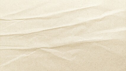 Crumpled brown paper background texture with copy space for design. Recycled brown paper wrinkled...
