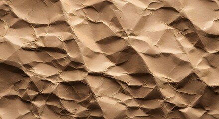 Crumpled brown paper texture background for design and artwork with shadows and light