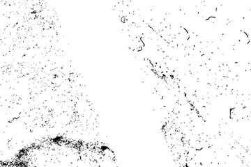 Abstract black speckles and subtle grunge texture overlay pattern on a white background