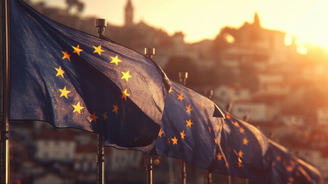 European Union Flags Wave Gracefully in a City During Sunset, Capturing the Spirit of Europe Day Celebrations