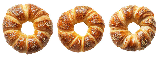 Flaky, golden-brown ring-shaped Bagel sprinkled with sesame and poppy seeds, isolated on white transparent background.