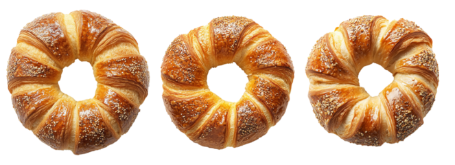 Flaky, golden-brown ring-shaped Bagel sprinkled with sesame and poppy seeds, isolated on white transparent background.