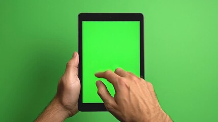 Businessperson's hands interacting with a green screen monitor, symbolizing advertise, announcement, collaboration, conference, editable, isolate, lcd, metropolitan, seminar, business