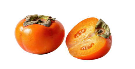 Ripe orange fruit halves with visible seeds on black background