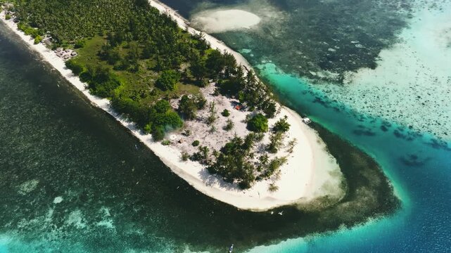 Aerial View of Long Tropical Island, Canabugan island, Balabac Philippines
crystal clear water and healthy coral reefs. The vibrant colors of the ocean contrast beautifully with the lush green palm