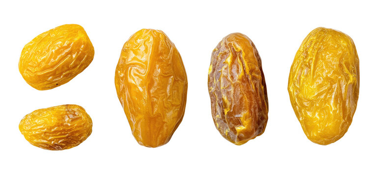 Four dried fruits, golden and amber, isolated on black