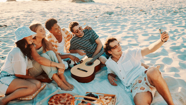 Smile, people and selfie for picnic on beach for photography, social media post and holiday. Happy, friends and profile picture update for travel memory, group gathering and bonding for ocean getaway - Powered by Adobe