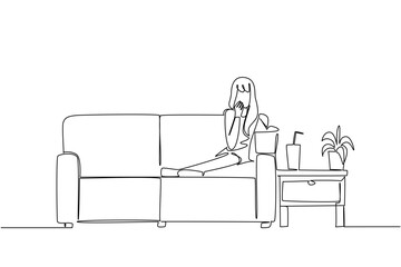 One line draw of a woman lying down on a couch with popcorn bucket, watching a show and reaching for a drink on a side table. Evoking comfort, leisure, and cinematic escape. National Movie Night event