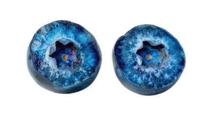 Two vibrant, ripe blueberries split to reveal their detailed, juicy interior