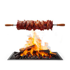 A large spit with meat for shawarma on fire